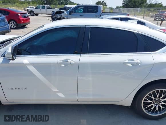 2015 Chevrolet Impala LT z VIN 1G1115SL4FU143467, wystawiony jako IAAI lot #43182559 z przebiegiem 131 015 mil mil oraz . Historia ofert i sprzedaży dostępna na DreamBid. Obrazek 14.