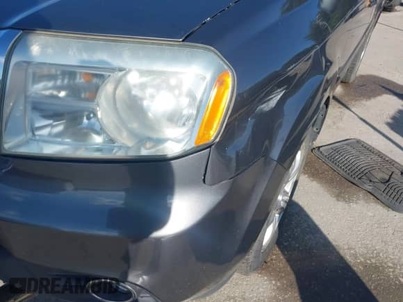 2013 Honda Pilot EX-L with VIN 5FNYF3H55DB015104, listed as a IAAI auction lot 43291700 with 176,544 mi miles and . Bid and sale history available at DreamBid. Image 6.