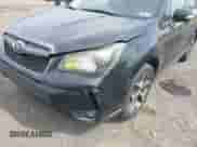 2014 Subaru Forester XT Touring z VIN JF2SJGMC1EH405328, wystawiony jako IAAI lot #43177698 z przebiegiem 156 351 mil mil oraz . Historia ofert i sprzedaży dostępna na DreamBid. Obrazek 6.