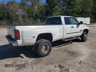 2002 Dodge 3500 с VIN 3B7MF33C42M204856, выставлен на аукционе Copart как лот 75734824 с пробегом 109 735 миль миль и Списание • Salvage title. История ставок и продаж доступна на DreamBid. Изображение 3.