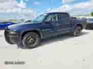 2002 Dodge Dakota Sport z VIN 1B7HL38N62S692851, wystawiony jako Copart lot #63767335 z przebiegiem 218 871 mil mil oraz Szkoda całkowita • Salvage title. Historia ofert i sprzedaży dostępna na DreamBid. Obrazek 1.