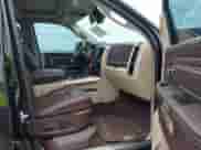 2015 Ram 1500 Laramie Longhorn with VIN 1C6RR7PM7FS606530, listed as a IAAI auction lot 42909293 with 179,250 mi miles and . Bid and sale history available at DreamBid. Image 5.