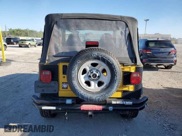 2000 Jeep Wrangler SE with VIN 1J4FA29P3YP705536, listed as a Copart auction lot 70344835 with 97,028 mi miles and Clean title. Bid and sale history available at DreamBid. Image 6.