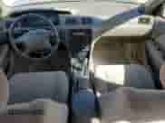 2001 Toyota Camry CE z VIN JT2BG22K610576099, wystawiony jako Copart lot #70216365 z przebiegiem 53 200 mil mil oraz Szkoda całkowita • Salvage title. Historia ofert i sprzedaży dostępna na DreamBid. Obrazek 8.