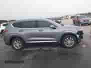 2019 Hyundai Santa Fe SEL with VIN 5NMS33AD0KH079644, listed as a IAAI auction lot 43240251 with 57,648 mi miles and . Bid and sale history available at DreamBid. Image 14.