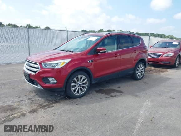 2017 Ford Escape Titanium с VIN 1FMCU9JD7HUB60495, выставлен на аукционе IAAI как лот 43137414 с пробегом 98 068 миль миль и . История ставок и продаж доступна на DreamBid. Изображение 2.
