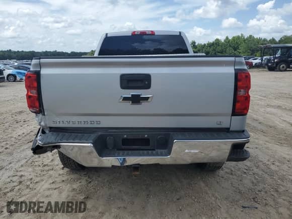 2015 Chevrolet Silverado 1500 LT с VIN 1GCRCREH7FZ287536, выставлен на аукционе Copart как лот 64613545 с пробегом 136 191 миль миль и Списание • Salvage title. История ставок и продаж доступна на DreamBid. Изображение 6.