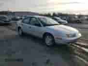 2002 Saturn SL with VIN 1G8ZF52802Z255309, listed as a Copart auction lot 84173835 with 152,728 mi miles and Salvage title. Bid and sale history available at DreamBid. Image 4.