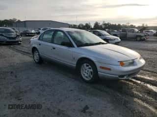 2002 Saturn SL с VIN 1G8ZF52802Z255309, выставлен на аукционе Copart как лот 84173835 с пробегом 152 728 миль миль и Списание • Salvage title. История ставок и продаж доступна на DreamBid. Изображение 4.