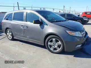2012 Honda Odyssey Touring с VIN 5FNRL5H94CB106763, выставлен на аукционе IAAI как лот 43309470 с пробегом 154 794 миль миль и . История ставок и продаж доступна на DreamBid. Изображение 1.