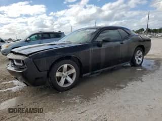 2009 Dodge Challenger SE с VIN 2B3LJ44VX9H560674, выставлен на аукционе Copart как лот 87184845 с пробегом 203 300 миль миль и Чистый • Clean title. История ставок и продаж доступна на DreamBid. Изображение 1.