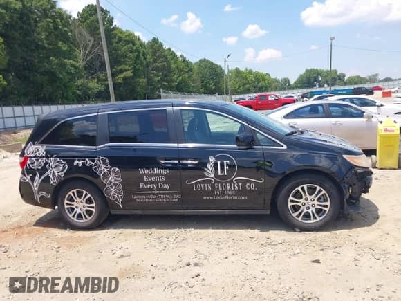 2013 Honda Odyssey EX-L с VIN 5FNRL5H62DB087153, выставлен на аукционе IAAI как лот 42597656 с пробегом 142 779 миль миль и . История ставок и продаж доступна на DreamBid. Изображение 14.