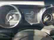 2021 Jeep Wrangler Unlimited 80th Anniversary with VIN 1C4HJXDG5MW636920, listed as a Copart auction lot 83747135 with 55,505 mi miles and Salvage title. Bid and sale history available at DreamBid. Image 9.