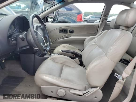 1996 Saturn 2dr Coupe with VIN 1G8ZH1279TZ371071, listed as a Copart auction lot 66602245 with 107,563 mi miles and Salvage title. Bid and sale history available at DreamBid. Image 7.