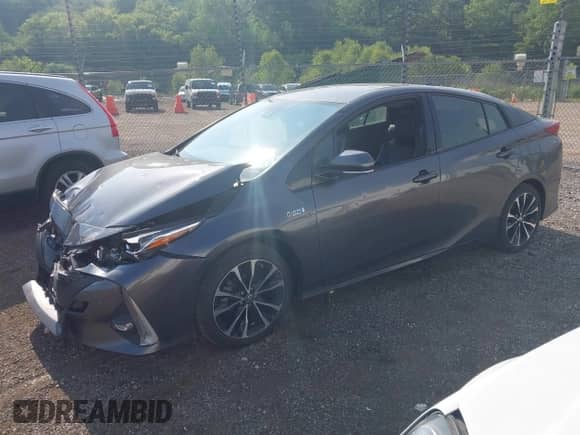 2018 Toyota Prius Plus z VIN JTDKARFP2J3072803, wystawiony jako IAAI lot #42443376 z przebiegiem 120 009 mil mil oraz . Historia ofert i sprzedaży dostępna na DreamBid. Obrazek 17.