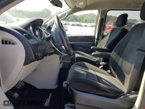 2014 Dodge Grand Caravan American Value with VIN 2C4RDGBG1ER163297, listed as a Copart auction lot 81726835 with 188,781 mi miles and Salvage title. Bid and sale history available at DreamBid. Image 7.