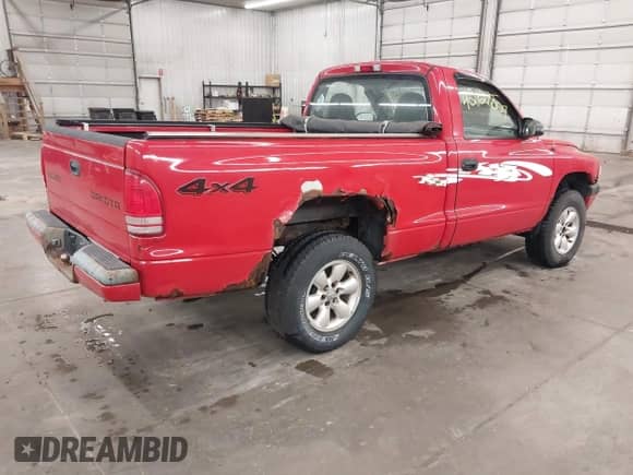 2003 Dodge Dakota с VIN 1D7GG36XX3S296482, выставлен на аукционе IAAI как лот 42127807 с пробегом 199 096 миль миль и . История ставок и продаж доступна на DreamBid. Изображение 4.