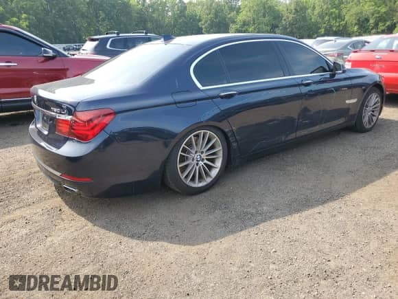 2015 BMW 7 Series 750Li xDrive with VIN WBAYF8C52FD654410, listed as a Copart auction lot 60043135 with 52,509 mi miles and Salvage title. Bid and sale history available at DreamBid. Image 3.