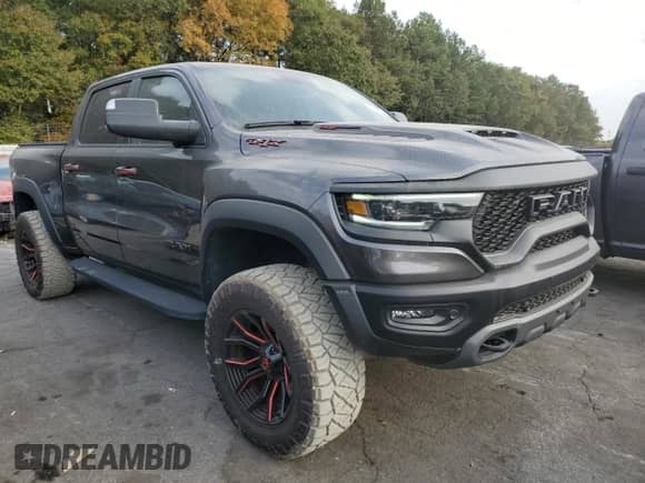 2021 Ram 1500 TRX с VIN 1C6SRFU96MN757768, выставлен на аукционе Copart как лот 78042444 с пробегом 37 770 миль миль и Списание • Salvage title. История ставок и продаж доступна на DreamBid. Изображение 4.