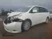 2015 Toyota Sienna Limited with VIN 5TDDK3DC0FS101949, listed as a Copart auction lot 61479235 with 100,898 mi miles and Salvage title. Bid and sale history available at DreamBid. Image 1.