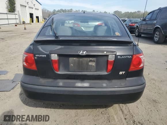 2004 Hyundai Elantra GT z VIN KMHDN56D94U122795, wystawiony jako Copart lot #46501145 z przebiegiem 139 258 mil mil oraz Szkoda całkowita • Salvage title. Historia ofert i sprzedaży dostępna na DreamBid. Obrazek 6.