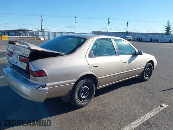 1998 Toyota Camry LE with VIN JT2BG22K3W0151088, listed as a IAAI auction lot 41429977 with 435,394 mi miles and . Bid and sale history available at DreamBid. Image 4.