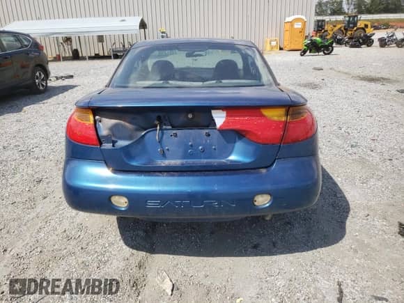 2002 Saturn SC with VIN 1G8ZP12852Z202191, listed as a Copart auction lot 64678935 with 170,757 mi miles and Salvage title. Bid and sale history available at DreamBid. Image 6.