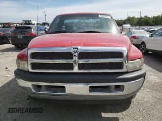 1994 Dodge RAM z VIN 1B7KC26C4RS580948, wystawiony jako Copart lot #69521474 z przebiegiem 141 275 mil mil oraz Nie do naprawy • Non repairable. Historia ofert i sprzedaży dostępna na DreamBid. Obrazek 5.