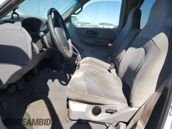 1999 Ford F-150 XL with VIN 1FTRX18L4XKB62686, listed as a Copart auction lot 84807295 with 189,359 mi miles and Salvage title. Bid and sale history available at DreamBid. Image 7.