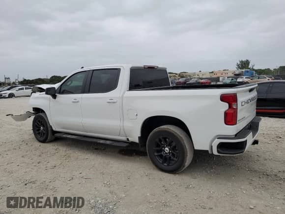 2023 Chevrolet Silverado 1500 z VIN 1GCPADE86PZ321242, wystawiony jako Copart lot #77026824 z przebiegiem 7 400 mil mil oraz Szkoda całkowita • Salvage title. Historia ofert i sprzedaży dostępna na DreamBid. Obrazek 2.