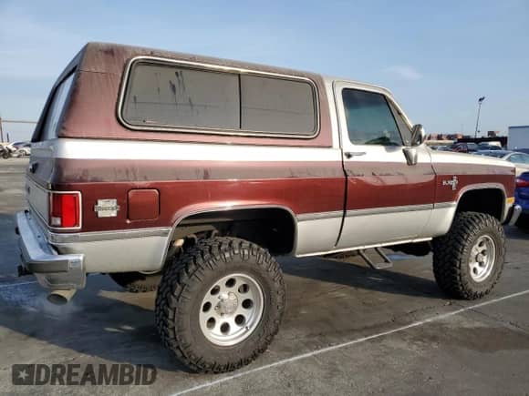 1986 Chevrolet Blazer with VIN 1G8EK18L6GF175066, listed as a Copart auction lot 43594865 with 34,731 mi miles and Salvage title. Bid and sale history available at DreamBid. Image 3.