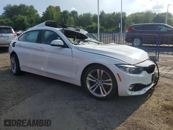 2018 BMW 4 Series 430i xDrive with VIN WBA4J3C57JBG95820, listed as a Copart auction lot 66998505 with Not provided miles and Non repairable. Bid and sale history available at DreamBid. Image 4.