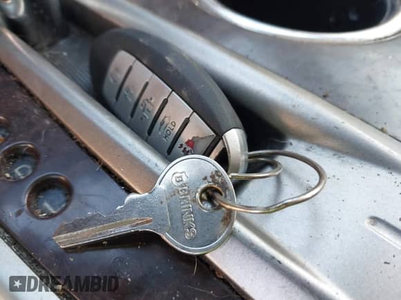 2014 Nissan Pathfinder Platinum Hybrid with VIN 5N1CR2MN5EC640761, listed as a IAAI auction lot 42654416 with 179,570 mi miles and . Bid and sale history available at DreamBid. Image 11.