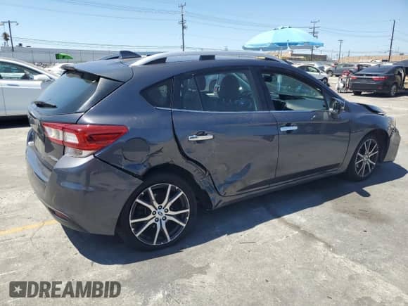 2018 Subaru Impreza Limited с VIN 4S3GTAU64J3706902, выставлен на аукционе Copart как лот 70543955 с пробегом 54 627 миль миль и Списание • Salvage title. История ставок и продаж доступна на DreamBid. Изображение 3.