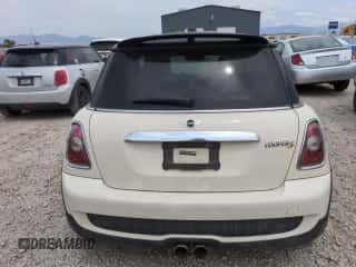 2009 MINI Hardtop S with VIN WMWMF73569TW87347, listed as a Copart auction lot 59445035 with 118,336 mi miles and Salvage title. Bid and sale history available at DreamBid. Image 6.