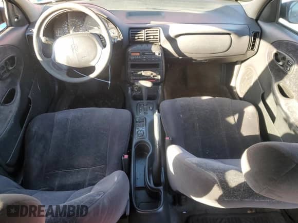 1997 Saturn SL с VIN 1G8ZK5279VZ389386, выставлен на аукционе Copart как лот 41429015 с пробегом 104 764 миль миль и На запчасти • Non repairable. История ставок и продаж доступна на DreamBid. Изображение 8.
