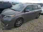 2017 Toyota Sienna SE with VIN 5TDXZ3DC6HS801986, listed as a Copart auction lot 81088525 with 80,230 mi miles and Salvage title. Bid and sale history available at DreamBid. Image 1.