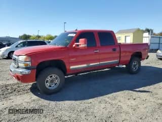 2005 Chevrolet Silverado 2500HD LS with VIN 1GCHK23265F854890, listed as a Copart auction lot 85727785 with 221,534 mi miles and Salvage title. Bid and sale history available at DreamBid. Image 1.