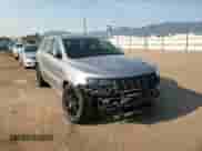 2014 Jeep Grand Cherokee SRT-8 z VIN 1C4RJFDJ6EC191973, wystawiony jako Copart lot #69803205 z przebiegiem 82 537 mil mil oraz Szkoda całkowita • Salvage title. Historia ofert i sprzedaży dostępna na DreamBid. Obrazek 13.