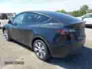 2023 Tesla Model Y Long Range z VIN 7SAYGDEE0PA201841, wystawiony jako IAAI lot #43158634 z przebiegiem 10 356 mil mil oraz . Historia ofert i sprzedaży dostępna na DreamBid. Obrazek 3.