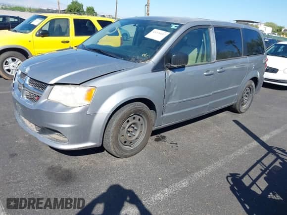2014 Dodge Grand Caravan SE 30th Anniversary with VIN 2C4RDGBG5ER354463, listed as a IAAI auction lot 43276117 with 167,280 mi miles and . Bid and sale history available at DreamBid. Image 2.