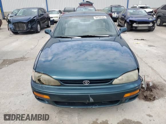 1996 Toyota Camry DX z VIN 4T1BG12K0TU771270, wystawiony jako Copart lot #64760345 z przebiegiem 198 961 mil mil oraz Nie do naprawy • Non repairable. Historia ofert i sprzedaży dostępna na DreamBid. Obrazek 5.