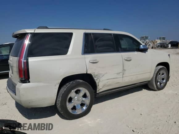 2015 Chevrolet Tahoe LTZ with VIN 1GNSCCKC9FR706761, listed as a Copart auction lot 86709605 with 181,421 mi miles and Salvage title. Bid and sale history available at DreamBid. Image 3.