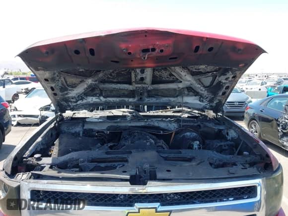2007 Chevrolet Silverado 1500 1LT z VIN 3GCEK13MX7G502251, wystawiony jako IAAI lot #42381393 z przebiegiem Nie podano mil oraz . Historia ofert i sprzedaży dostępna na DreamBid. Obrazek 10.