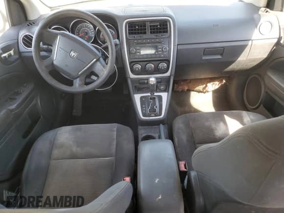 2011 Dodge Caliber Heat z VIN 1B3CB5HA6BD262474, wystawiony jako Copart lot #71105075 z przebiegiem 118 429 mil mil oraz Szkoda całkowita • Salvage title. Historia ofert i sprzedaży dostępna na DreamBid. Obrazek 8.