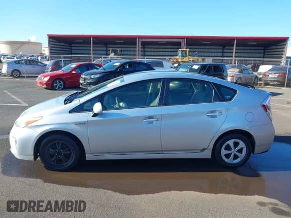 2012 Toyota Prius One with VIN JTDKN3DUXC5507990, listed as a IAAI auction lot 42207854 with 118,068 mi miles and . Bid and sale history available at DreamBid. Image 14.