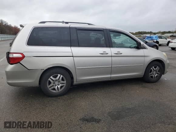 2007 Honda Odyssey EX-L с VIN 5FNRL38787B415077, выставлен на аукционе Copart как лот 90330325 с пробегом 182 719 миль миль и Списание • Salvage title. История ставок и продаж доступна на DreamBid. Изображение 3.