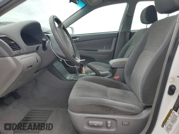 2005 Toyota Camry LE с VIN 4T1BE32K35U640354, выставлен на аукционе Copart как лот 82371375 с пробегом 188 481 миль миль и Списание • Salvage title. История ставок и продаж доступна на DreamBid. Изображение 7.