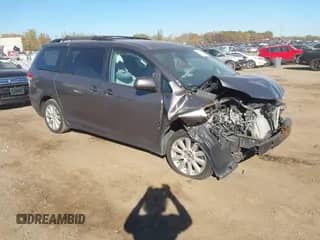 2014 Toyota Sienna LE with VIN 5TDJK3DC9ES092945, listed as a IAAI auction lot 43472669 with 229,682 mi miles and . Bid and sale history available at DreamBid. Image 1.