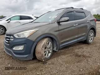 2014 Hyundai Santa Fe с VIN 5XYZU3LA3EG212720, выставлен на аукционе Copart как лот 63099705 с пробегом 137 315 миль миль и Списание • Salvage title. История ставок и продаж доступна на DreamBid. Изображение 1.